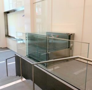 Glass ad Steel Wheelchair Lift installed in NYC