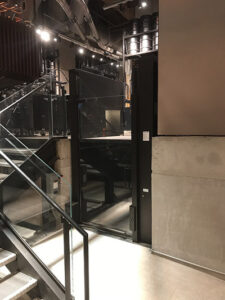 Wheelchair Lift ready to take someone upstairs in a starbucks