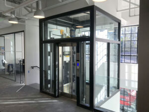 Top floor view of a commercial glass elevator